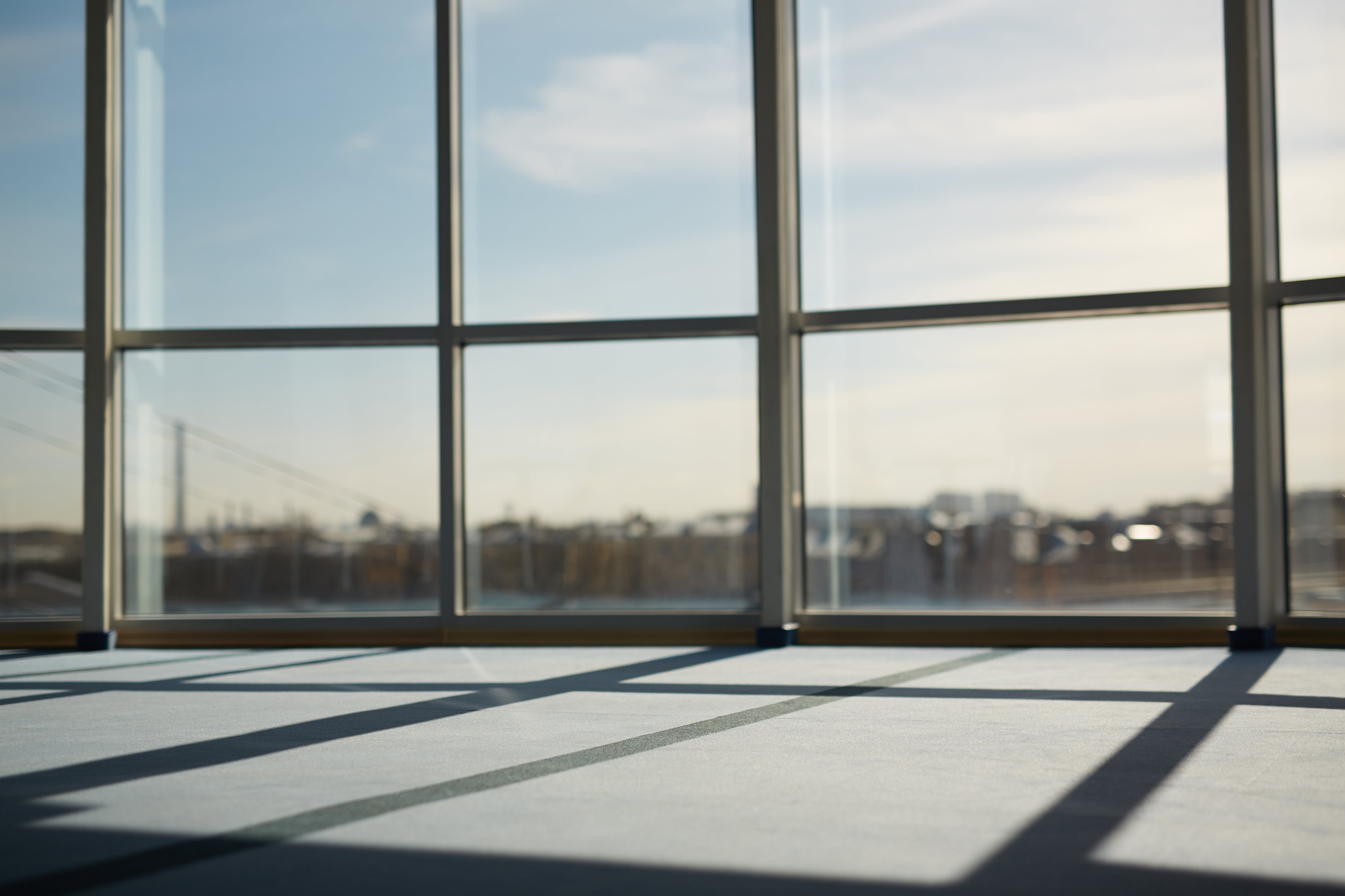 Heat-Blocking Window Film vs. Low-E Glass for Buildings