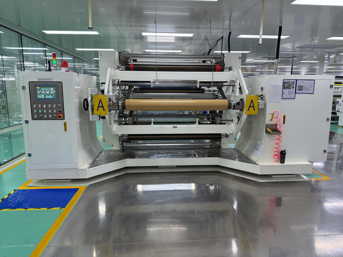 Slitting and rewinding machine