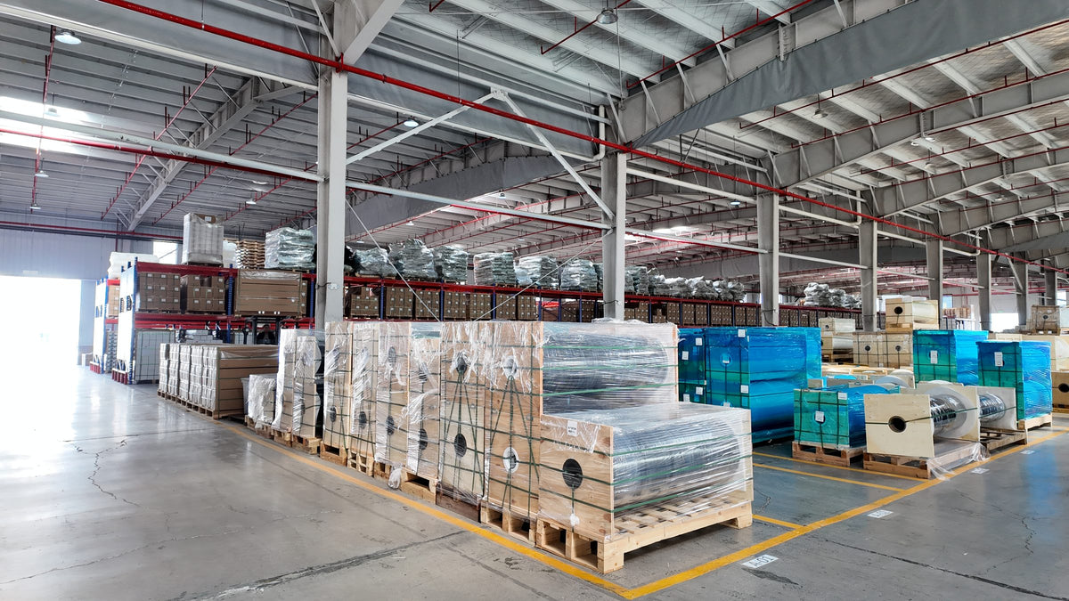 Master film rolls packed on pallets in the HIGHCOOL factory warehouse in Shanghai